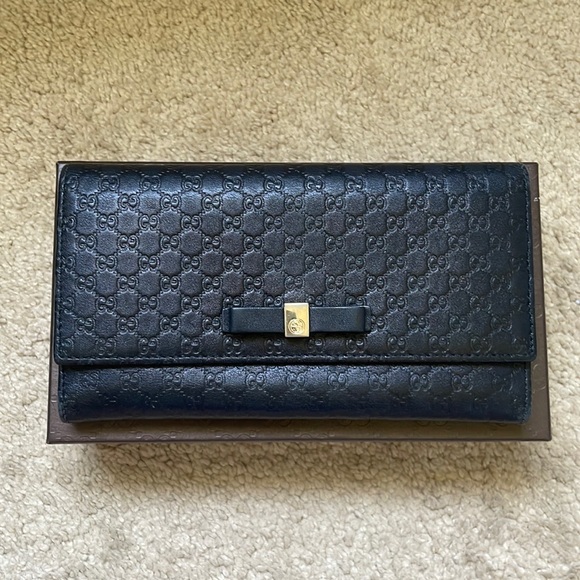 Gucci Handbags - AUTHENTIC Gucci Guccisima black wallet with bow